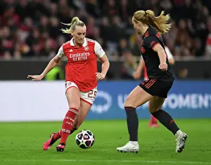 Bayern Munich V Arsenal Women 2022-23 Prints: Arsenal vs. Bayern Munich: A Quarter-Final Battle in the Women's Champions League
