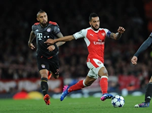 Arsenal V Bayern Munich 2016-17 Prints: Arsenal vs. Bayern Munich Showdown: Walcott vs. Vidal in UEFA Champions League Battle