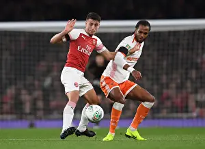 Arsenal V Blackpool Carabao Cup 2018-19 Prints: Arsenal vs. Blackpool: Intense Clash between Julio Pleguezuelo and Nathan Delfouneso in Carabao Cup
