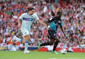 Arsenal V Boca Juniors 2011-12 Prints: Arsenal vs. Boca Juniors: Emirates Cup Showdown - Eboue vs. Schiavi