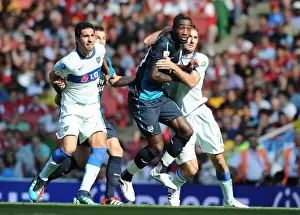 Arsenal V Boca Juniors 2011-12 Prints: Arsenal vs. Boca Juniors: Johan Djourou Clashes with Rolando Schiavi and Iuan Insaurralde