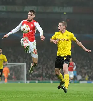 Arsenal V Borussia Dortmund 2014-15 Prints: Arsenal vs. Borussia Dortmund: A Champions League Showdown