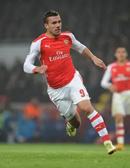 Arsenal V Borussia Dortmund 2014-15 Prints: Arsenal vs Borussia Dortmund: Lukas Podolski in Action, UEFA Champions League, 2014
