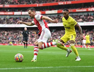 Arsenal V Brentford 2021-22 Prints: Arsenal vs Brentford: Cedric Clashes with Rico Henry in Premier League Showdown