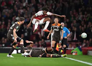 Arsenal V Brentford - Carabao Cup 2018-19 Prints: Arsenal vs Brentford: Iwobi vs Jeanvier in Carabao Cup Clash