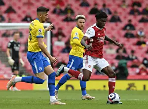 Arsenal V Brighton And Hove Albion 2020-21 Prints: Arsenal vs Brighton: Thomas Partey Clashes with Jakub Moder in Premier League Showdown (2020-21)