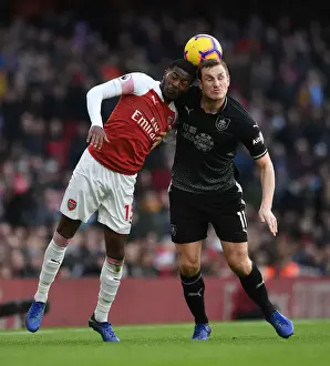 Arsenal V Burnley 2018-19 Prints: Arsenal vs Burnley: Ainsley Maitland-Niles vs Chris Wood Battle at Emirates Stadium