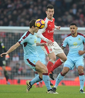 Arsenal V Burnley 2016-17 Prints: Arsenal vs Burnley: Clash Between Koscielny and Tarkowski