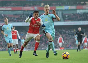 Arsenal V Burnley 2016-17 Prints: Arsenal vs Burnley: Clash between Sanchez and Mee in the Premier League