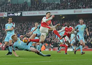 Arsenal V Burnley 2016-17 Prints: Arsenal vs Burnley: Laurent Koscielny Fouls Ben Mee in Intense Premier League Clash