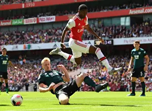Arsenal vs Burnley: Maitland-Niles Leaps Past Mee in Premier League Clash