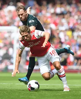 Arsenal vs Burnley: Monreal vs Barnes Clash in Premier League Showdown