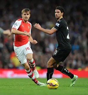 Arsenal V Burnley 2014/15 Prints: Arsenal vs Burnley: Ramsey vs Boyd - Intense Battle in the Premier League
