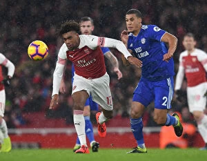 Arsenal v Cardiff City 2018-19 Collection: Arsenal vs. Cardiff: Iwobi Faces Off Against Peltier in Premier League Clash