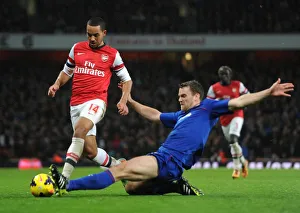 Arsenal V Cardiff City 2013-14 Prints: Arsenal vs. Cardiff: Walcott vs. Turner - Intense Battle in the Premier League