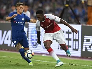Images Dated 23rd July 2017: Arsenal vs. Chelsea: Clash in China - Welbeck vs. Scott