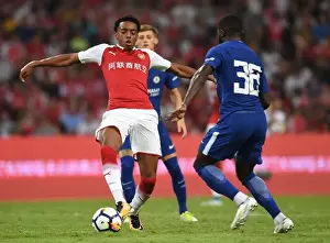 Arsenal V Chelsea - Pre Season 2017-18 Prints: Arsenal vs. Chelsea: Clash of the Titans - Pre-Season Battle between Joe Willock and Jeremie Boga in Beijing