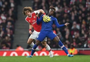 Arsenal v Chelsea 2019-20 Collection: Arsenal vs. Chelsea: David Luiz vs. Tammy Abraham Clash in the Premier League