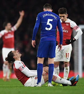Images Dated 19th January 2019: Arsenal vs. Chelsea: Hector Bellerin Suffers Injury in Intense Premier League Clash