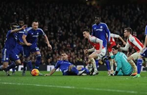 Images Dated 24th January 2016: Arsenal vs. Chelsea: Koscielny's Brave Block against Terry and Azpilicueta