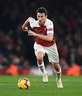 Arsenal vs. Chelsea: Laurent Koscielny in Action during the Intense Premier League Clash at Emirates Stadium