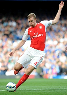 Chelsea V Arsenal 2014-15 Prints: Arsenal vs. Chelsea: Per Mertesacker at Stamford Bridge, 2014-15 Premier League Battle