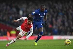 Arsenal v Chelsea 2019-20 Collection: Arsenal vs. Chelsea: Nelson Fouls by Zouma in Intense Premier League Clash (2019-20)