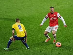 Images Dated 24th January 2014: Arsenal vs Coventry City: Kieran Gibbs vs Karl Baker - FA Cup Fourth Round Clash