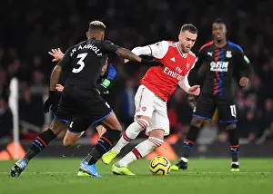 Arsenal vs Crystal Palace: A Clash Between Chambers and van Aanholt in the Premier League