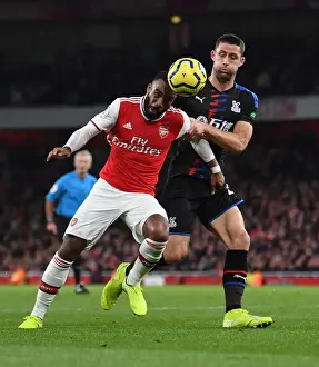 Arsenal V Crystal Palace 2019-20 Prints: Arsenal vs Crystal Palace: Lacazette Faces Off Against Cahill in Intense Premier League Clash