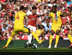 Arsenal V Crystal Palace 2018-19 Prints: Arsenal vs Crystal Palace: Ozil Faces Off Against Milivojevic and Wan-Bissaka