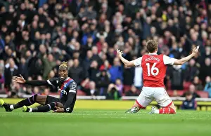 Arsenal V Crystal Palace 2022-23 Prints: Arsenal vs Crystal Palace: Rob Holding and Wilfred Zaha Clash in Premier League Showdown at Emirates Stadium