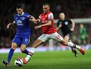 Images Dated 16th April 2013: Arsenal vs. Everton: Kieran Gibbs Tackles Kevin Mirallas in Intense Premier League Clash