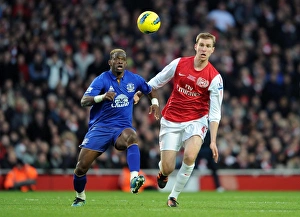 Arsenal V Everton 2011-12 Prints: Arsenal vs. Everton: Per Mertesacker vs. Louis Saha in Intense Premier League Clash