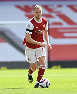 Arsenal vs Fulham: Emirates Stadium Showdown Amidst COVID-19 Restrictions (April 2021)