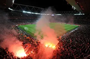 Arsenal V Galatasaray 2014/15 Champions League Prints: Arsenal vs. Galatasaray: Clash at Emirates Stadium with Flares from the Galatasaray Fans