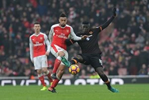 Images Dated 11th February 2017: Arsenal vs Hull City: Coquelin Clashes with Diaye in Premier League Showdown