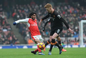 Arsenal v Hull City 2016-17 Collection: Arsenal vs Hull City: Elneny Tackles Clucas in Intense Premier League Clash