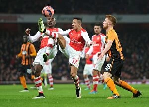 Images Dated 4th January 2015: Arsenal vs Hull City: FA Cup Clash - Sanchez and Campbell in Action