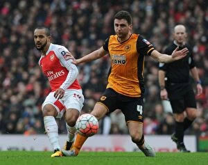 Arsenal v Hull City - FA Cup 2015-16 Collection: Arsenal vs Hull City: Theo Walcott vs Alex Bruce - FA Cup Fifth Round Clash