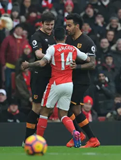 Arsenal vs Hull City: Walcott's Tense Encounter with Maguire and Huddlestone