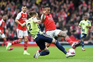 Arsenal vs Leeds United: Gabriel Jesus Tussles with Luke Ayling in Premier League Showdown (2022-23)