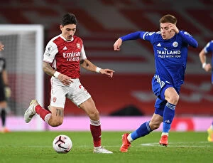 Images Dated 25th October 2020: Arsenal vs Leicester City: Hector Bellerin vs Harvey Barnes Clash in Empty Emirates Stadium