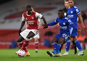 Images Dated 25th October 2020: Arsenal vs Leicester City: Pepe vs Mendy - Premier League Clash Amidst Empty Stands (2020-21)
