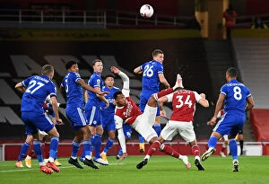 Images Dated 25th October 2020: Arsenal vs Leicester: Magalhaes Volleys Amid Empty Emirates Stadium, Premier League 2020-21