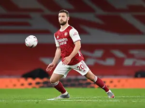 Arsenal V Leicester City 2020-21 Prints: Arsenal vs Leicester Showdown at Emirates Stadium: Mustafi's Focus in COVID-19 Era