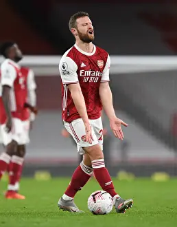 Arsenal V Leicester City 2020-21 Prints: Arsenal vs Leicester Showdown: Mustafi's Determination Amidst Emirates Empty Seats (October 2020)