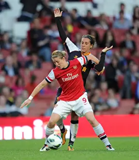Arsenal vs Liverpool: A Battle of Wills - Ellen White vs Fara Williams in FA WSL Action