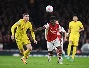 Arsenal vs. Liverpool: Bukayo Saka vs. Andrew Robertson Battle at Emirates Stadium