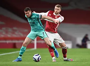 Arsenal vs. Liverpool: Clash at Emirates Stadium Amidst Pandemic Restrictions - Calum Chambers vs. James Milner
